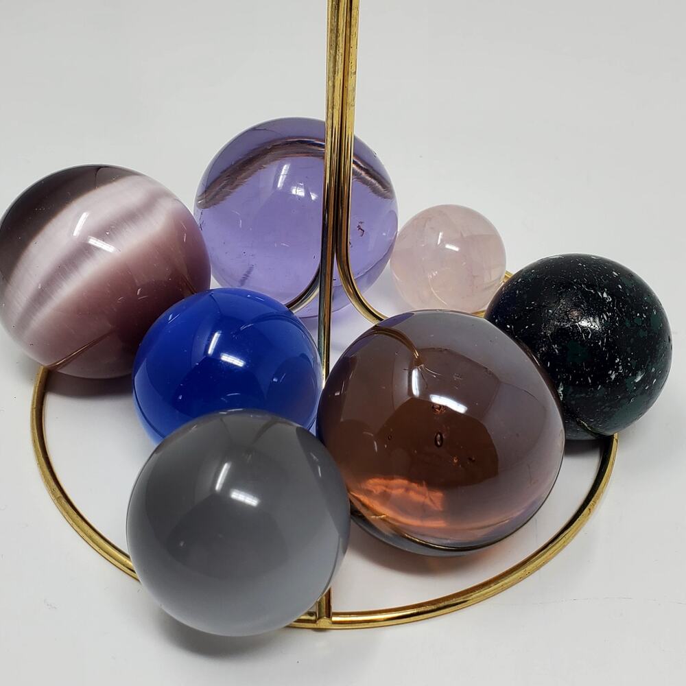 Lot of glass / Quartz balls - 7 total and different colors and size 847 grams